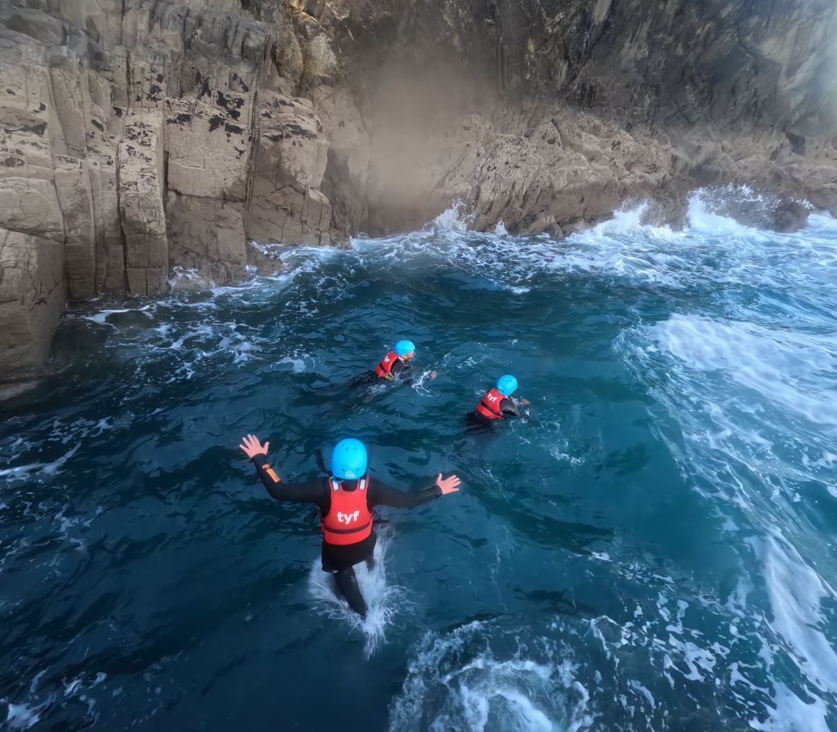 Open water swimming — arms wide