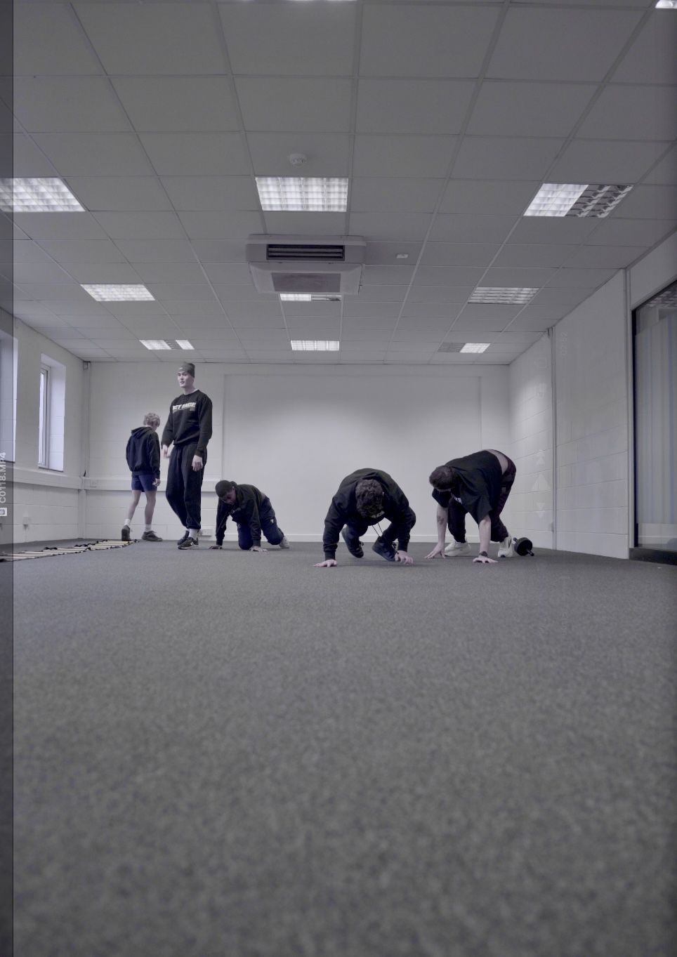 Bear crawls in the training space — everyone working together